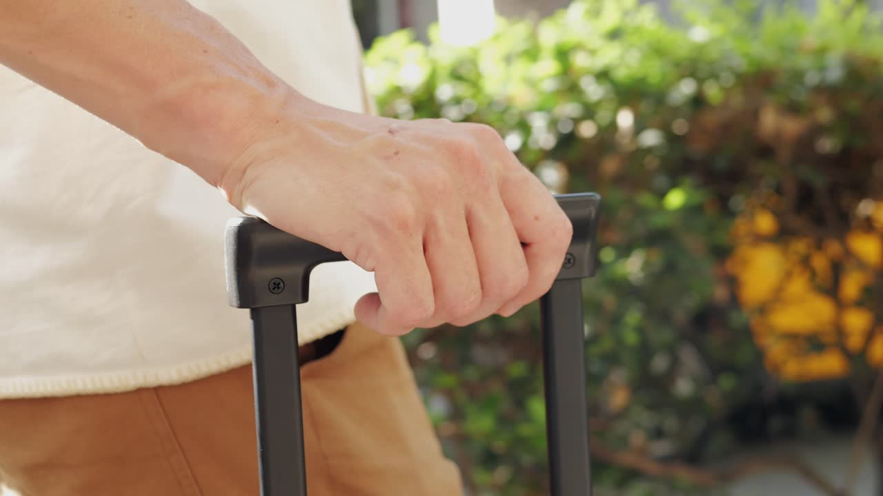 Person Pulling a Suitcase
