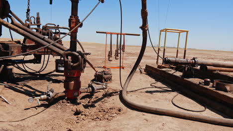 equipment and instruments used at the site for drilling natural resources. production of oil in the desert.