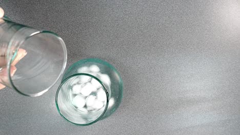 water in a jug with ice cubes