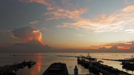 Nice-stable-drone-view-of-silhouetted-ship-from-Manila-port