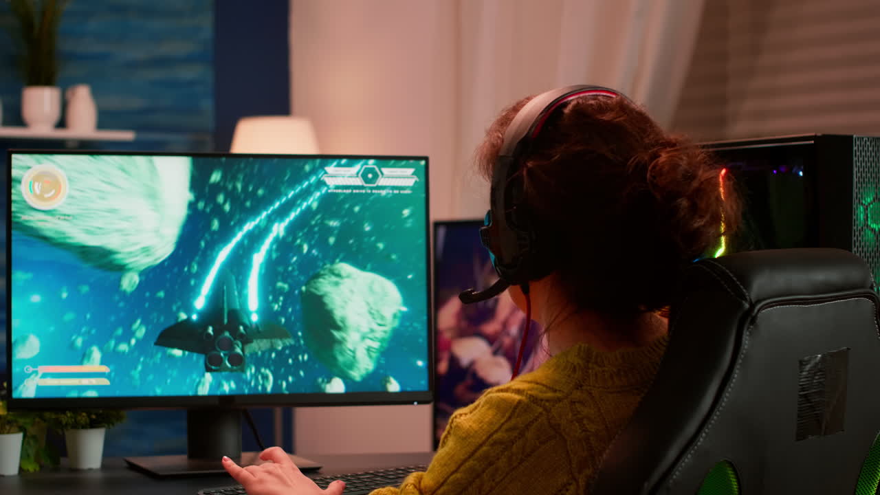 Joyful player celebrates victory winning space shooter video game