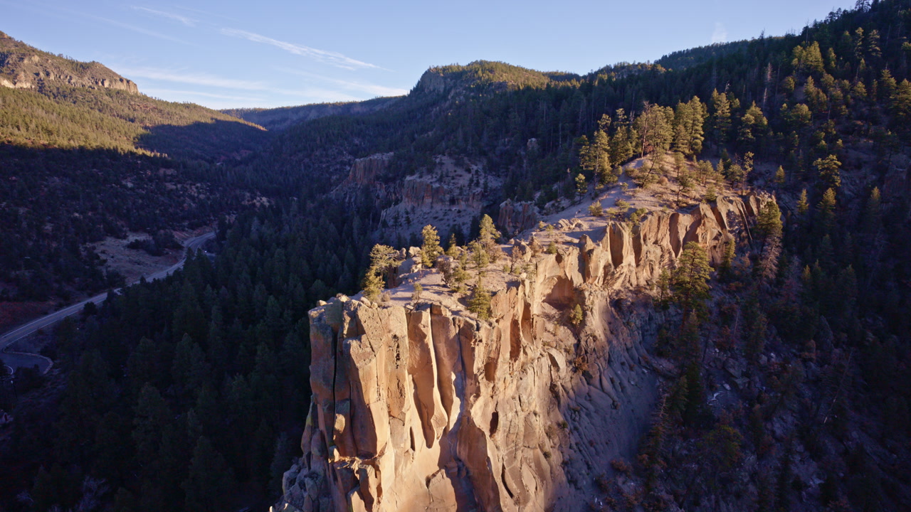 Aerial drone view of desert cliffs and deep canyon cuts near Los Alamos
