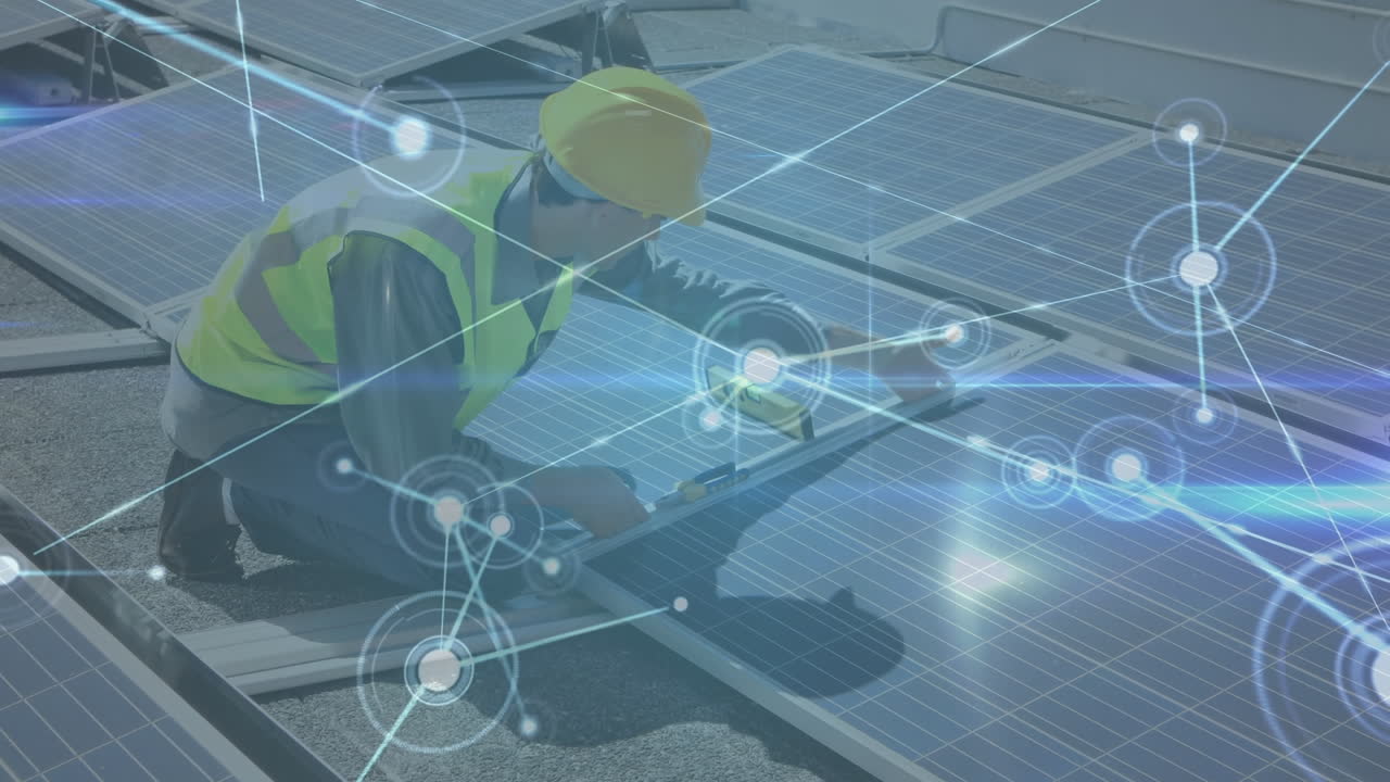 Animation of network of connections over male engineer setting up solar panels on the roof