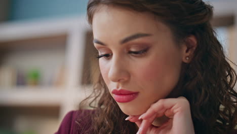 closeup thoughtful businesswoman face look camera in office. pensive woman work