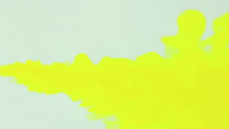 yellow color paint drops in water , drop of yellow ink color falling on water colorful ink , 4k footage,