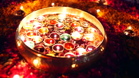 indian family decorating home for traditional diwali festivities