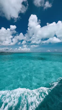 turquoise ocean with clouds