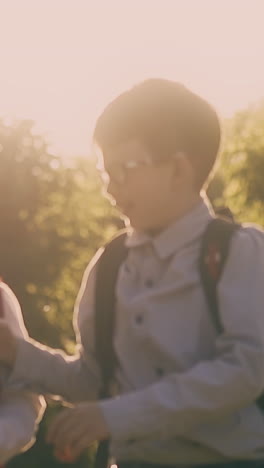 happy little guys silhouettes throw away textbooks after passing exam and give high five closeup slow motion