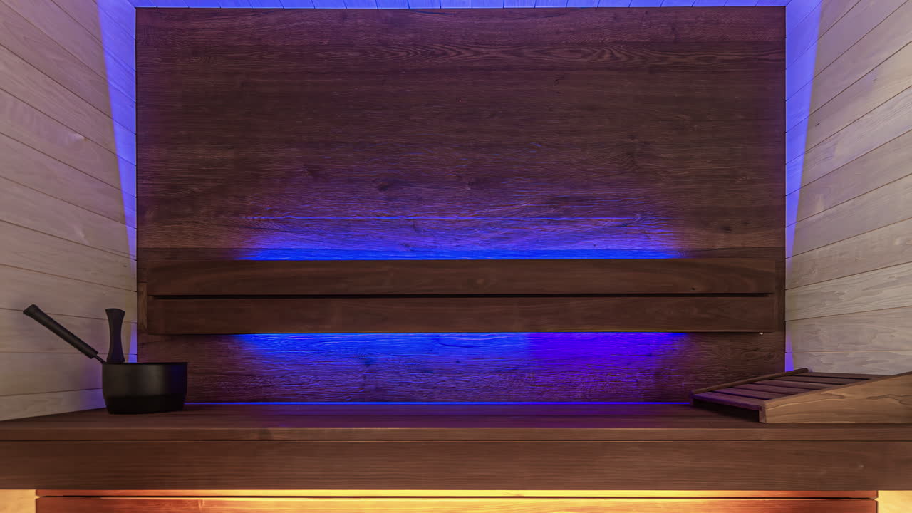 colores cambiantes dentro de la sauna de barril de madera moderna y vacía, primer plano