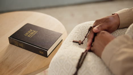 rosary, hands of person or bible study for faith