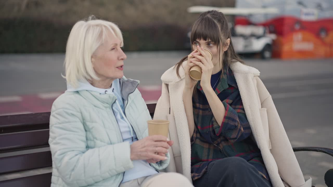 Two women having coffee and talking