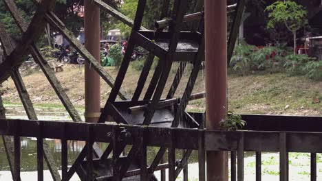 shot of a water wheel turning in the river