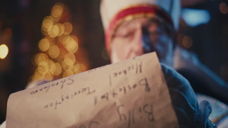sinterklaas with his list of names