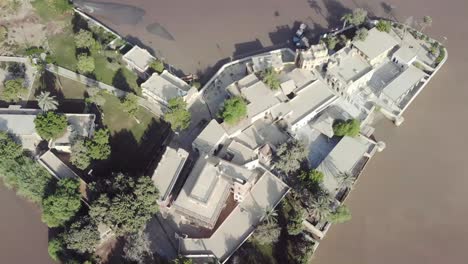 aerial of sadh belo island temple on the indus river, pakistan. top down view