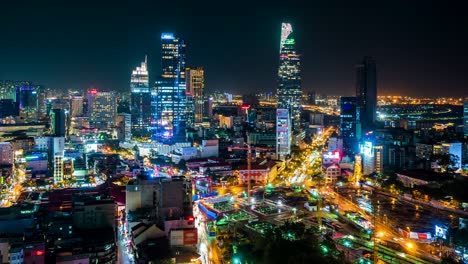 timelapse view of ho chi minh city, aka saigon, vietnam, showing rush hour traffic and landmark buildings in the financial district, zoom out