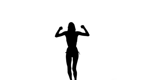 Silhouette-woman-jumping-in-slow-motion