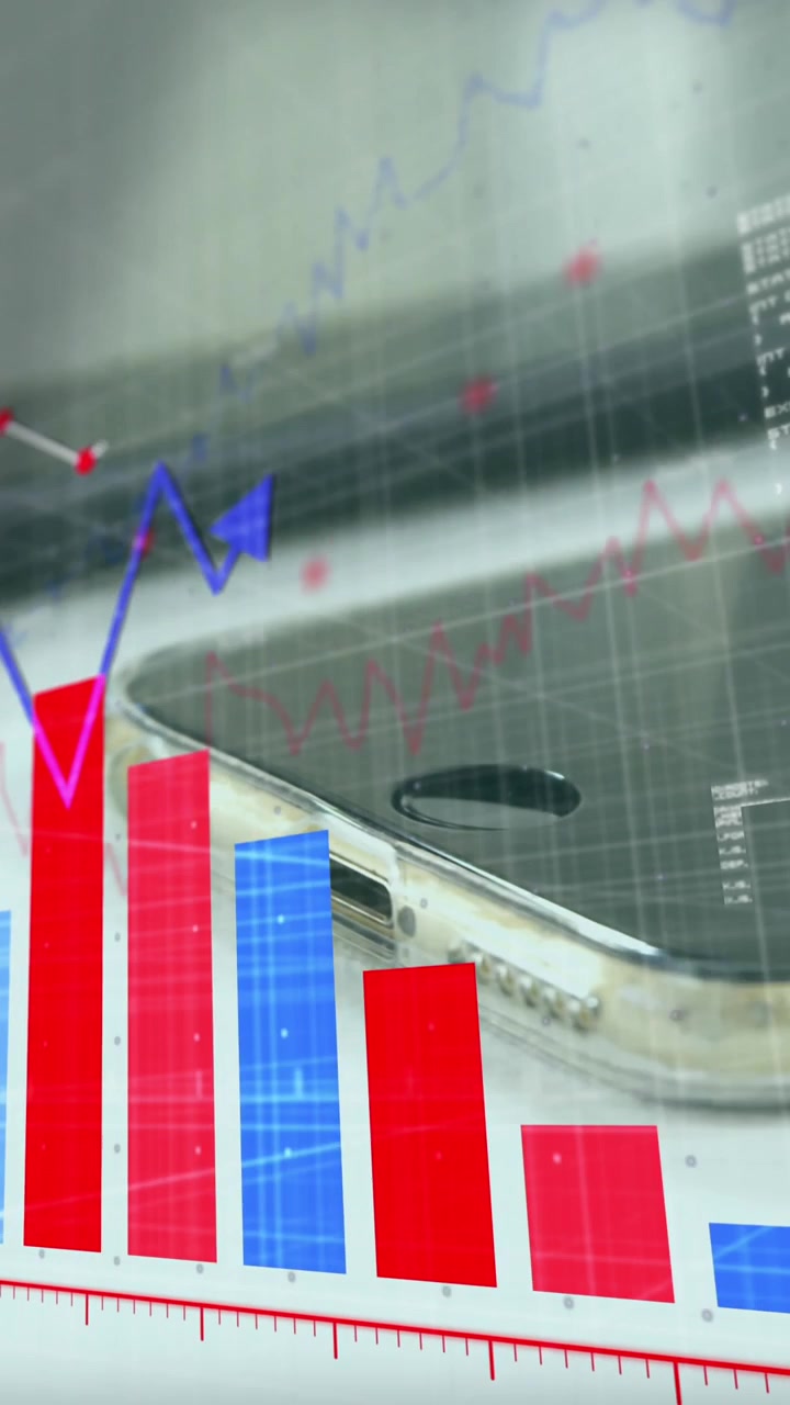 Animation of financial data processing over desk with electronic devices in office