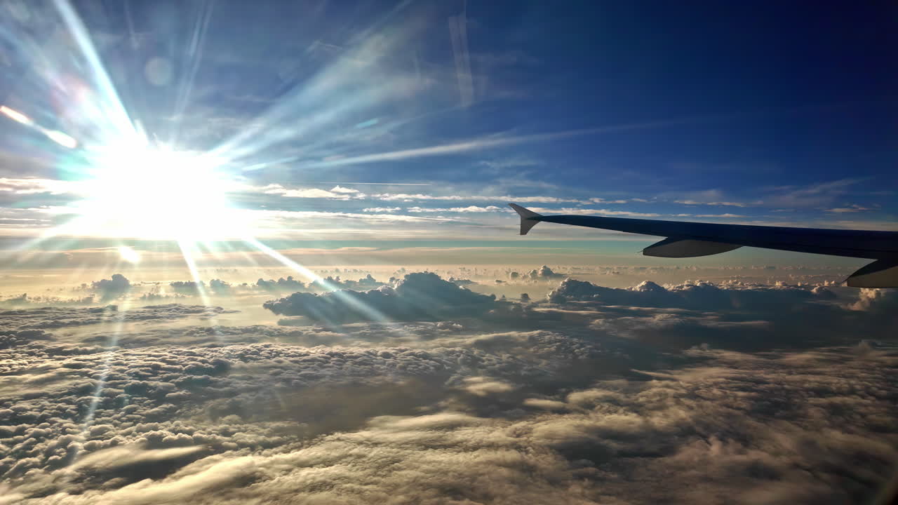 View of Airplane wing during brigth day over Crete sky, Greece