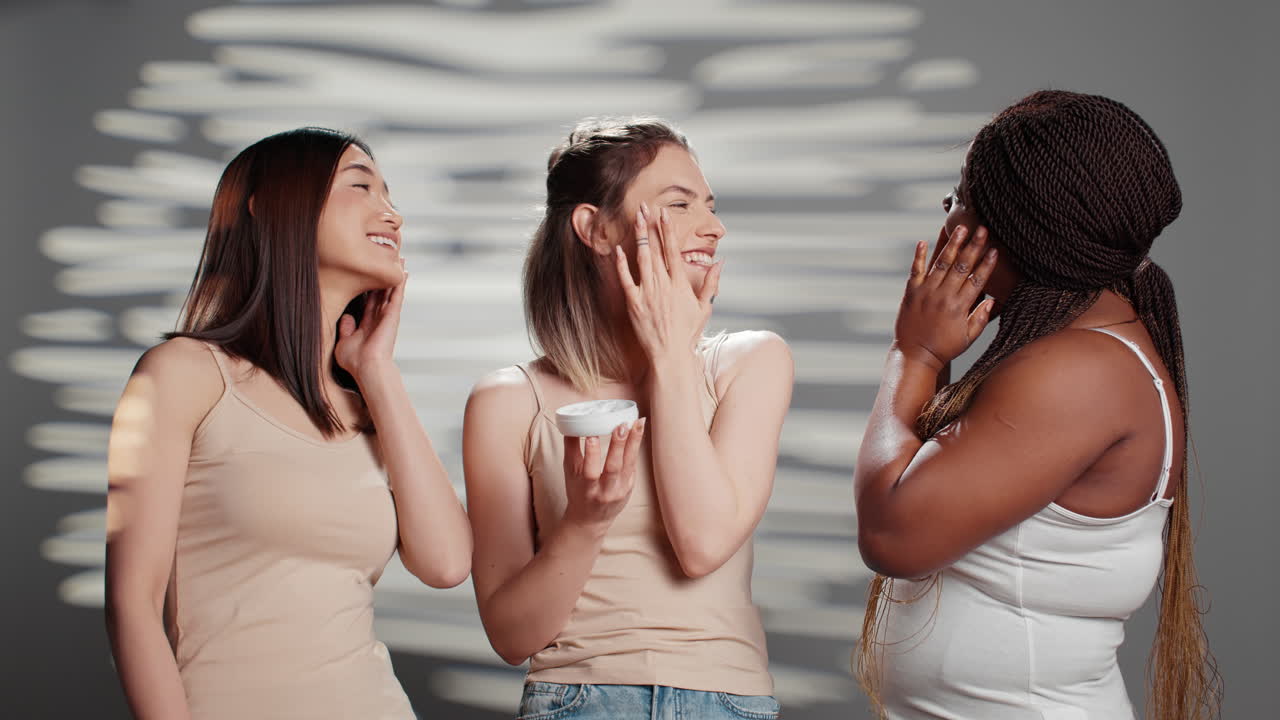 Diverse Group of Women Applying Skincare Cream