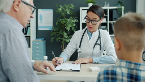 doctor consultation with elderly patient and child