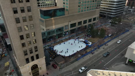 aerial view of downtown denver ice rink next to daniels and fisher tower