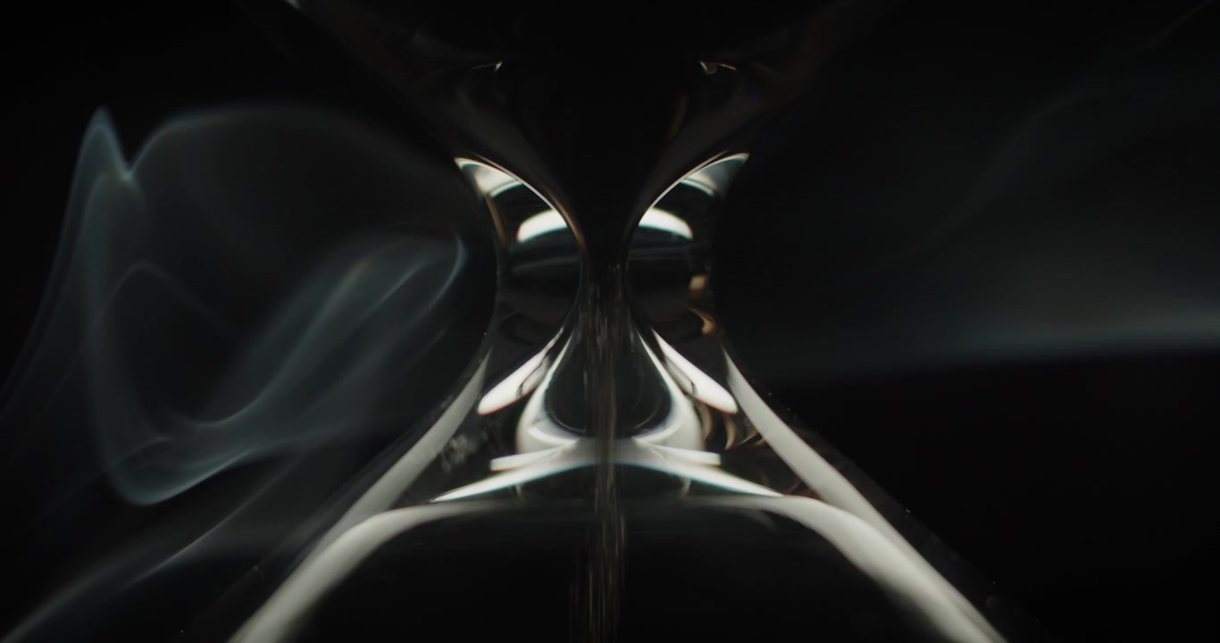 Close up of sand pouring in sand glass