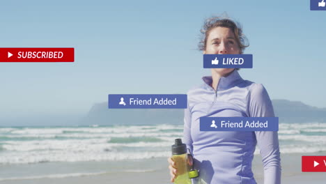 animation of social media notifications, over woman taking break from exercising on beach