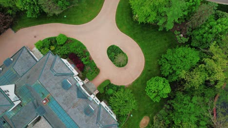 lowering aerial of a epic luxury mansion home in lake forest illinois, north of chicago