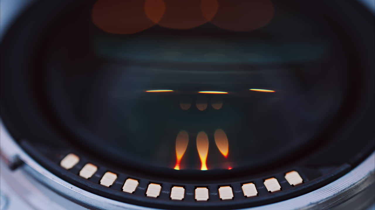 Close up of a camera lens on a wooden table