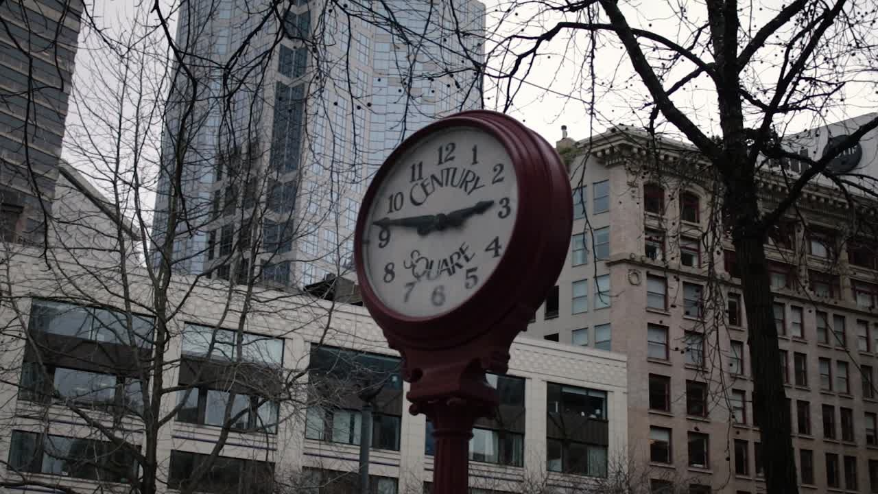Slow motion downtown Seattle city square clock