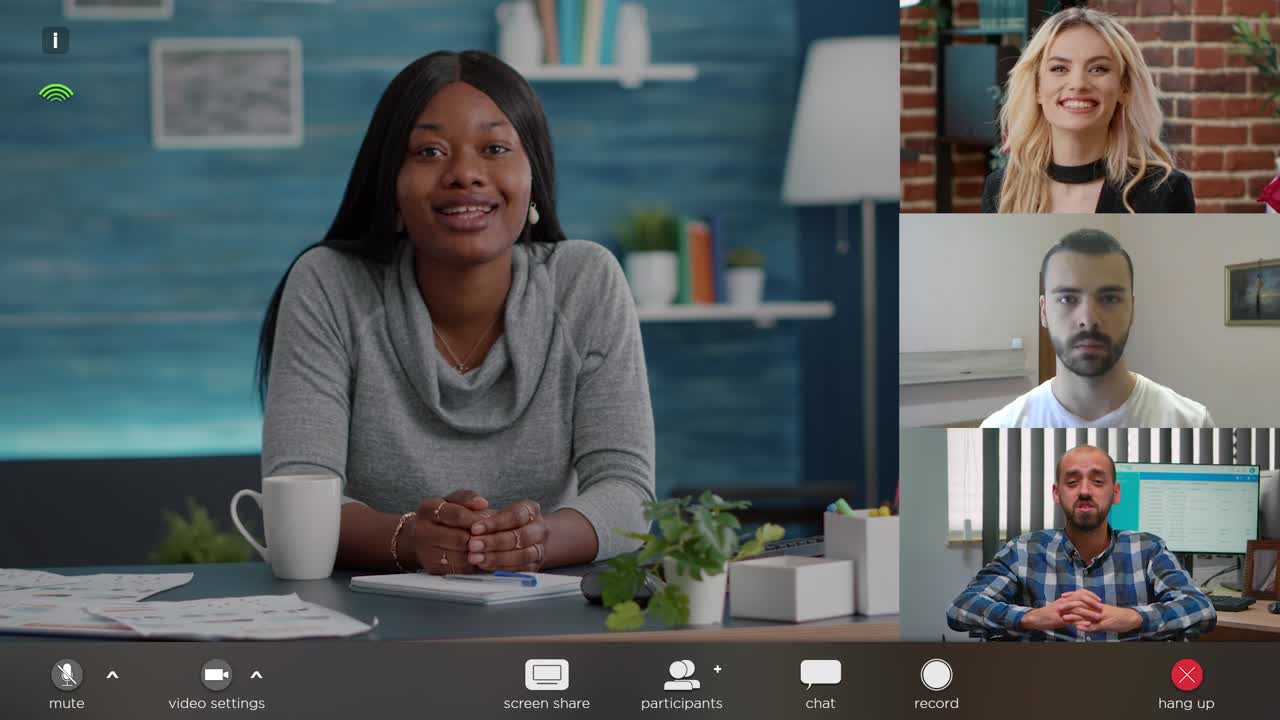 Business woman attending video call conference with diverse team