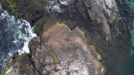 Top-down-shot-of-a-rock-in-the-ocean-near-Newport-Rhode-Island