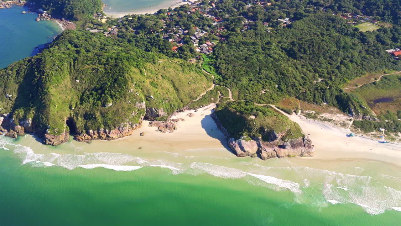 Aerial view of Lush Forest and Remote Beach on Ilha do Mel, Parana, Brazil