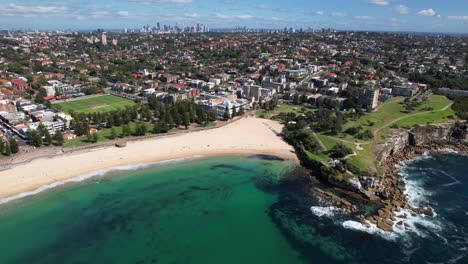 coogee beach in summer, sydney, nsw, australia - aerial drone shot