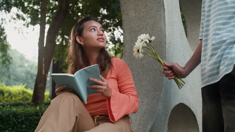 girl rejecting flowers from boy