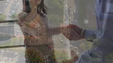 Animation-of-businessman-handshake-over-cityscape