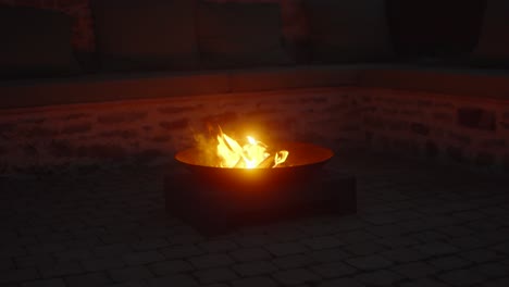 closeup reveals captivating scene of a radiant fire bowl outdoors