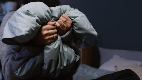 exhausted woman shouting on her bedroom