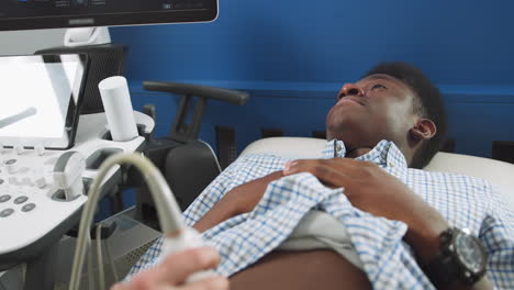 patient undergoing abdominal ultrasound