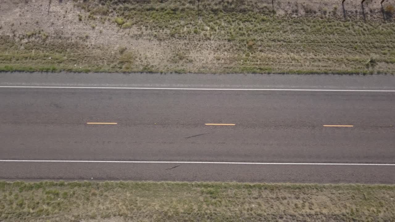 Drone — Looking straight down at a long stretch of Texas highway