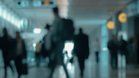 airport hall with walking people defocus