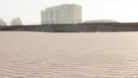 desert scene with buildings in background