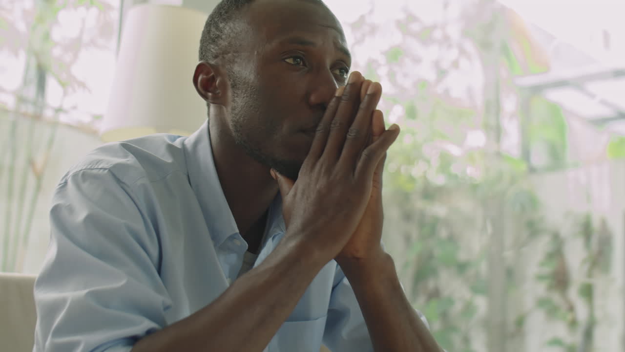 Upset African American Man Having Stress at Home