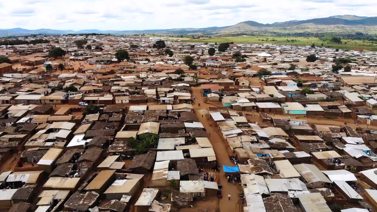 African slum in malawi, poor village from above, drone view Premium ...