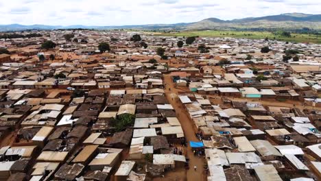 african slum in malawi, poor village from above, drone view