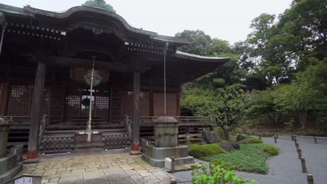 the exterior of the main buildings of japan's shinto temples are surrounded by beautiful gardens and exquisite architecture