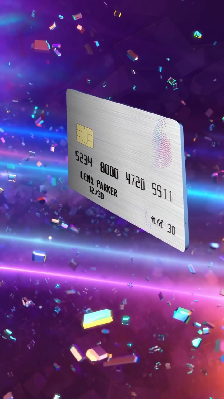 Silver Credit Card Floating Amidst Colorful Confetti and Neon Lights