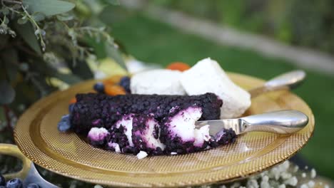 nutritious goat cheese with berries in a plate