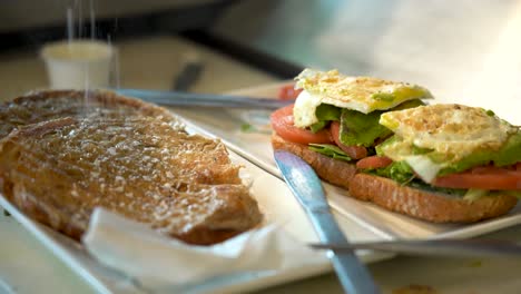 fresh vegetarian breakfast sandwich on a bright morning at a cafe