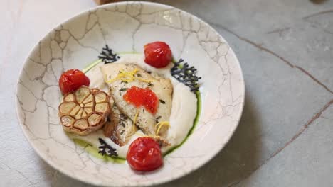 baked fish with mashed potatoes and toppings